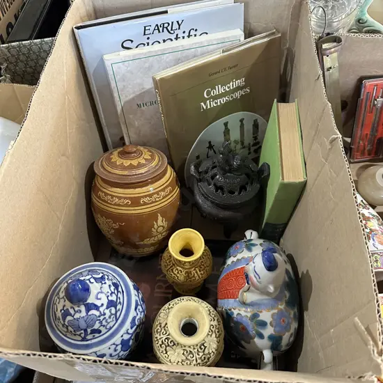 Box lot vintage chinese lucky foo dog cast metal incense, books, vases etc.