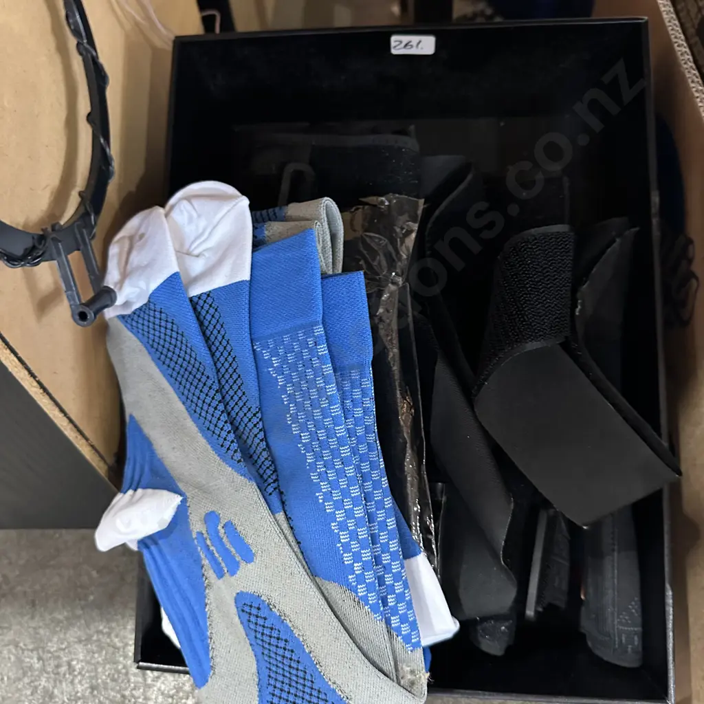 Box lot of new socks and knee braces etc. Image 1++