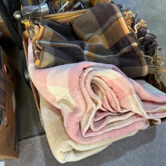 Three woollen blankets.