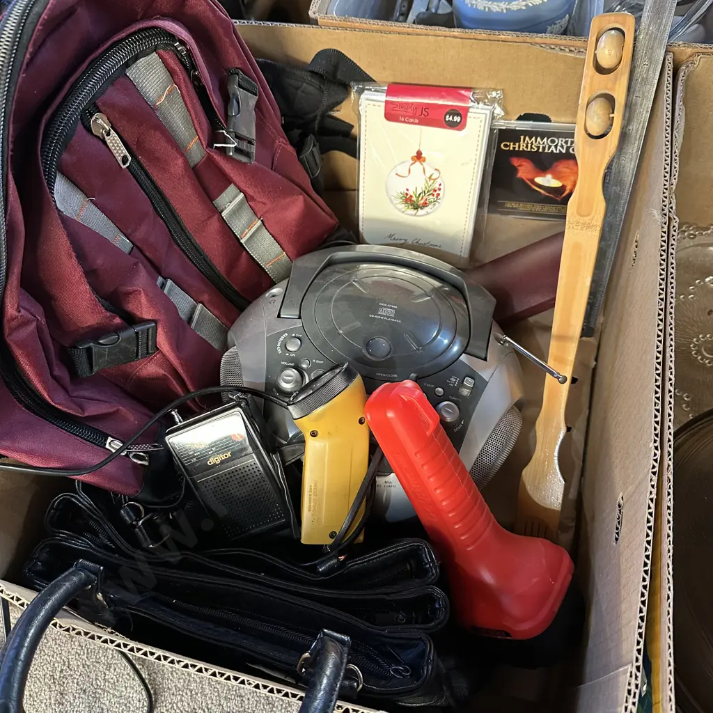 Box lot backpack, handbag, CD Radio, emergency radio and torches plus back scratcher etc. Image 1++