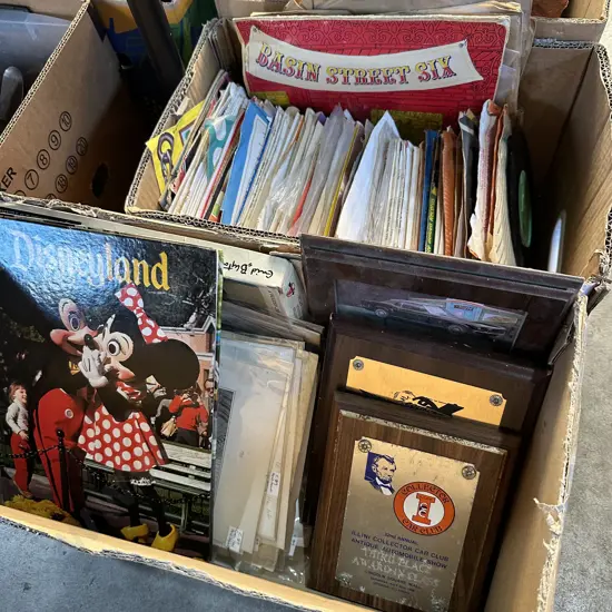 Two boxes 45s and 78s records, Disneyland photo book etc.