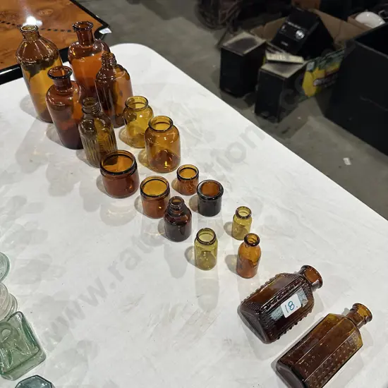 collection of coloured glass ink wells & bottles