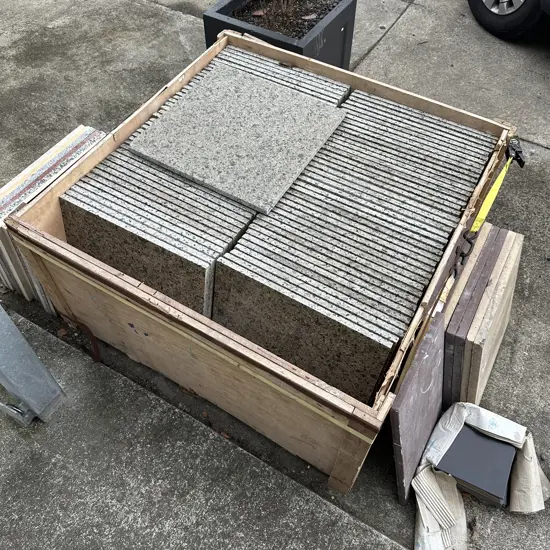 approx 44 tiles 500x500x20 plus other random tiles and pavers