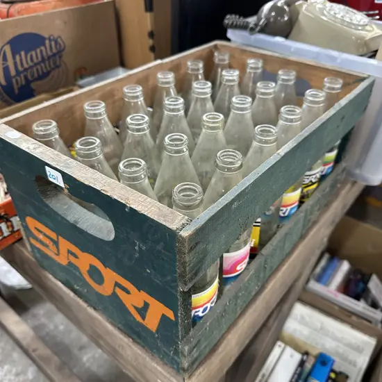 Vintage crate of SPORT bottles.