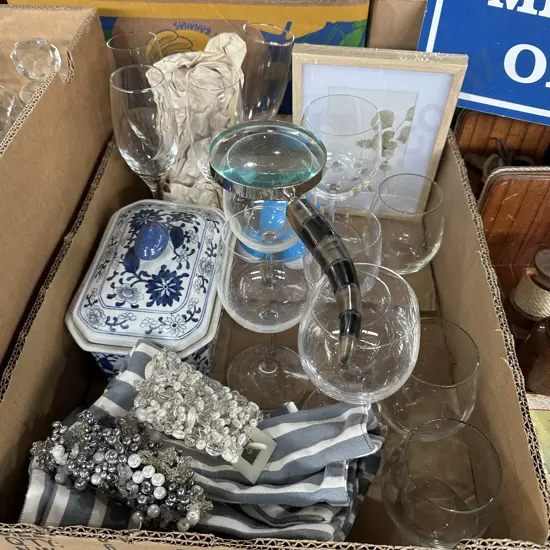 Box lot cushion covers, magnifying glass, new picture frame, costume jewellery etc.