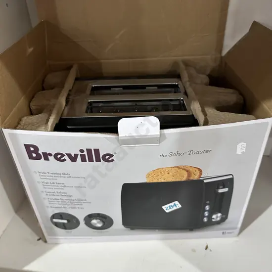 Boxed new Breville Toaster.