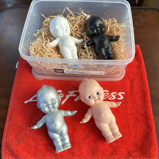 Original sideshow Kewpie doll plus three hand cast plaster dolls, from a single mould, then painted.