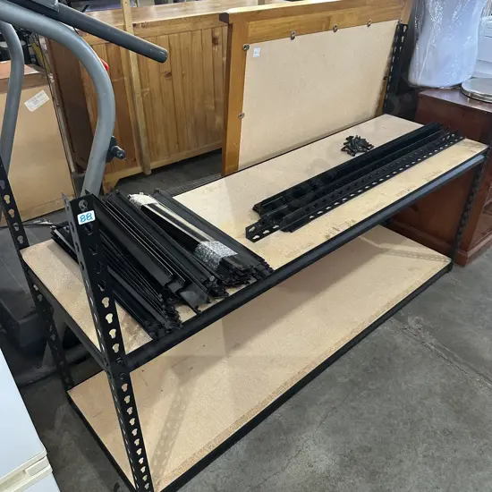 Large lot of flat packed shelving (22 sheets of wood 1500 x 450)