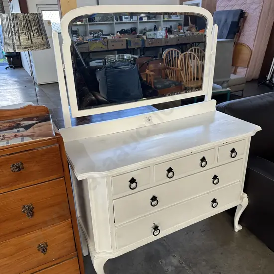 White painted dressing table with black ring-pull handles which are loose.