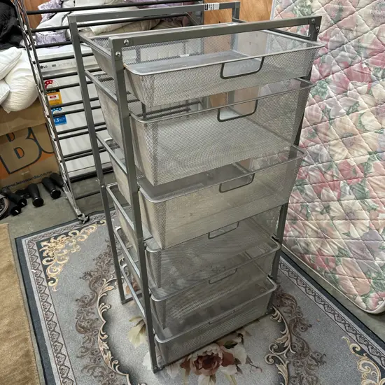 Six metal basket storage shelf.