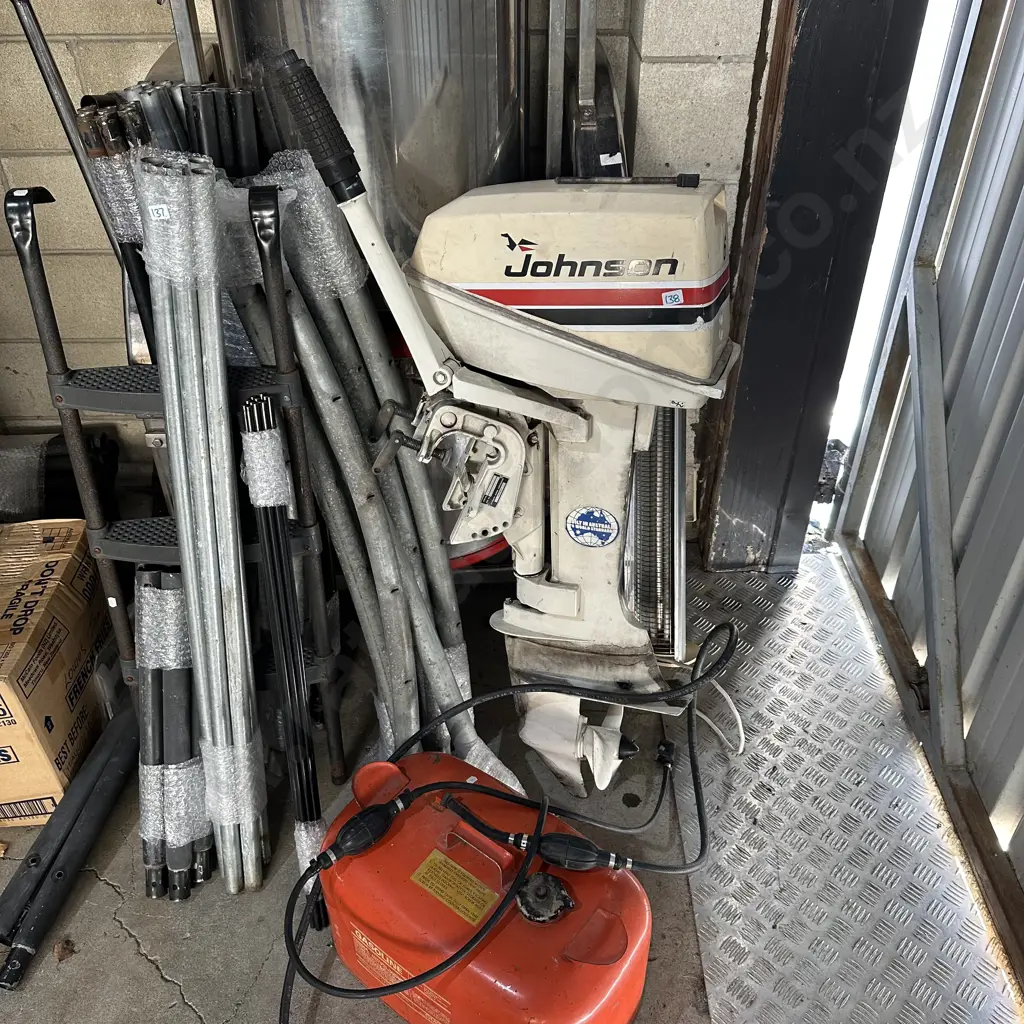Johnson outboard motor and fuel tank. Used in lake water, sold as working. Image 1++