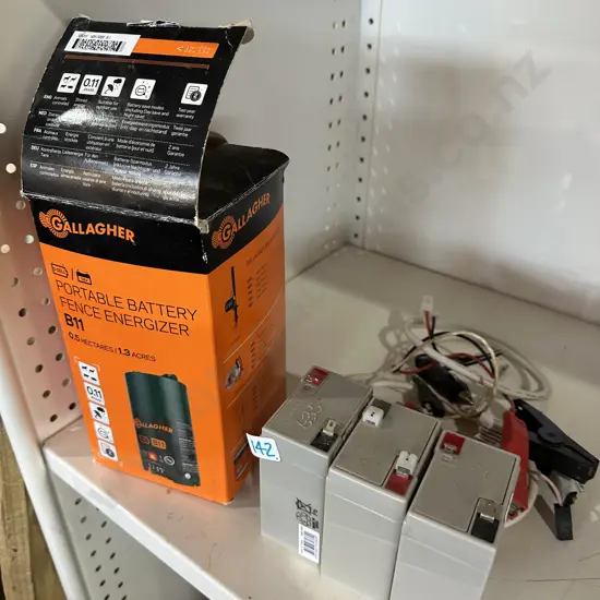 Portable Battery fence energizer plus batteries and cables.