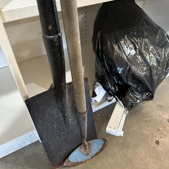 Spade, hoe and pedestal fan
