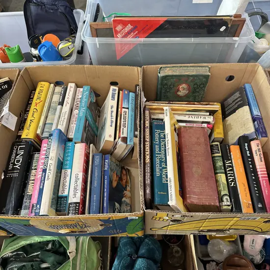 Two boxes of collectable books.