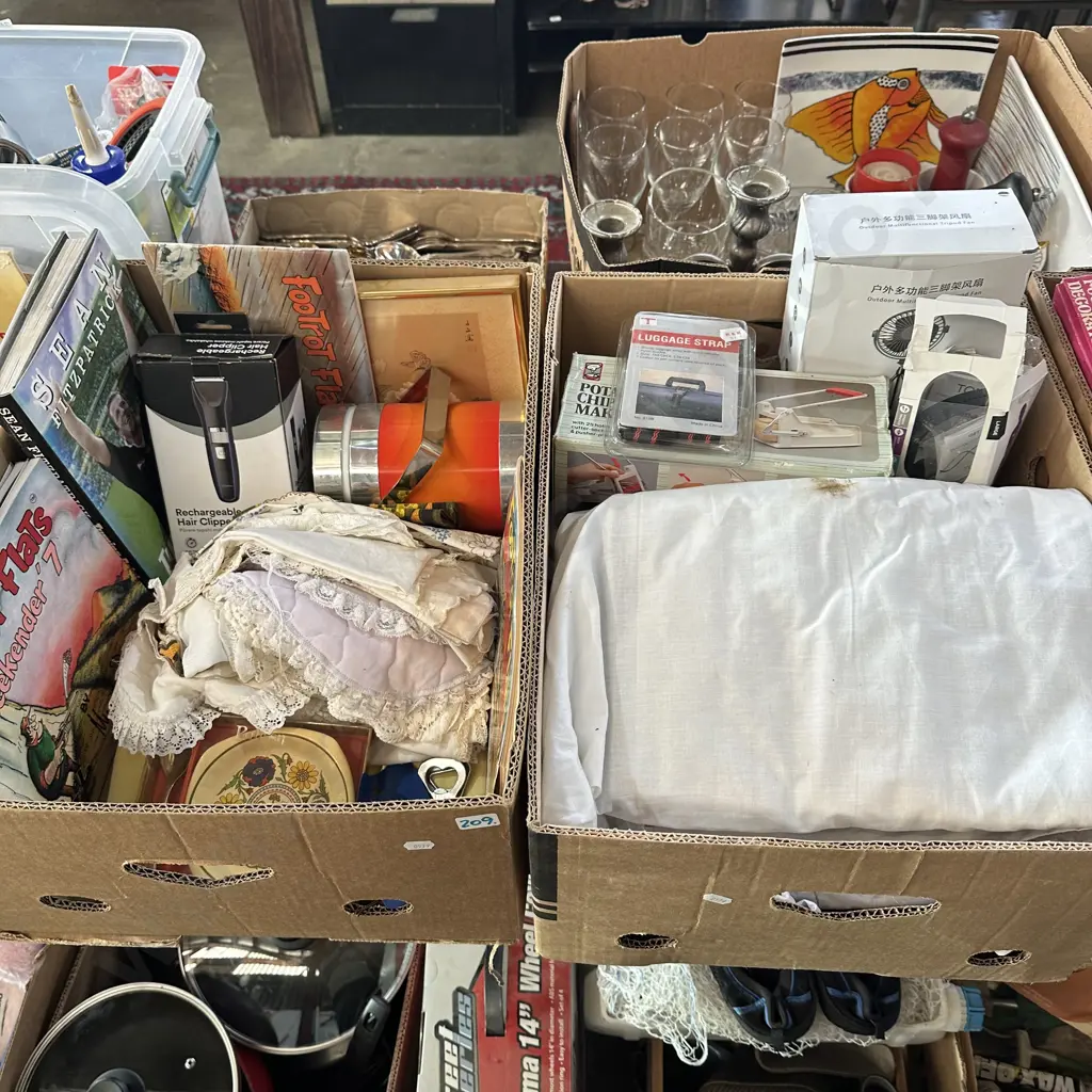Two boxes Footrot Flats comics, bedding, hair clippers etc. Image 1++
