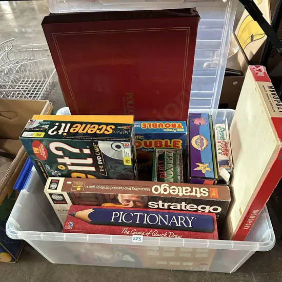 Large lidded Sistema bin full of games.