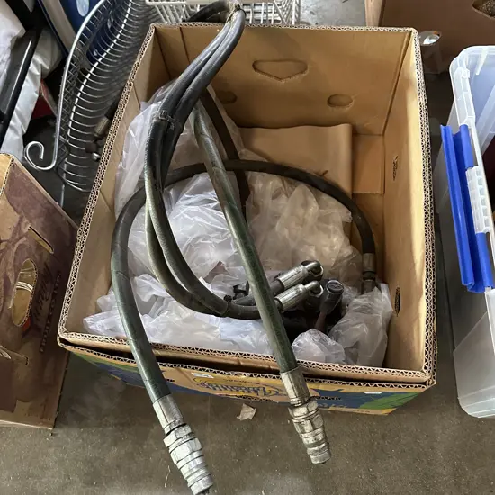 Hydraulic control valve and hoses attached.