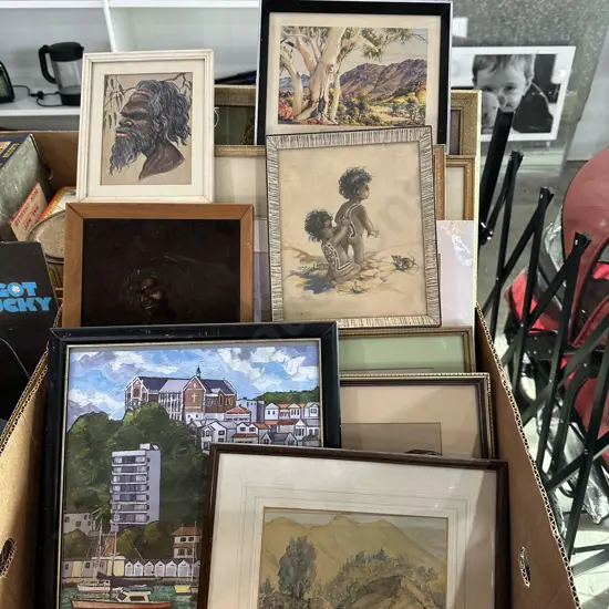Box of assorted pictures.