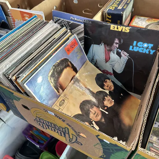 Box of assorted records including lots of Elvis, The beatles etc.