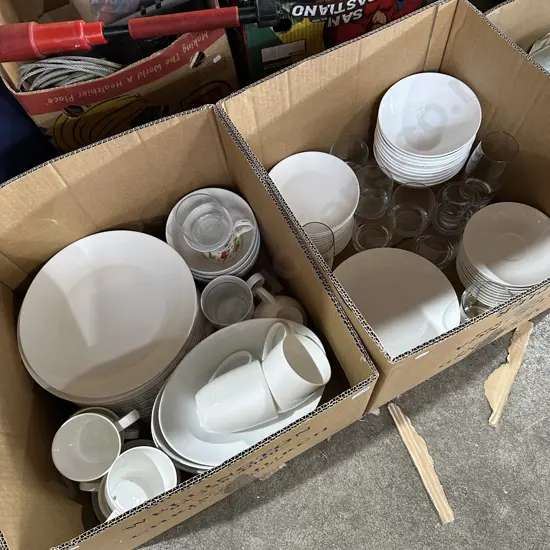 Two boxes dinnerware plates and glasses etc.