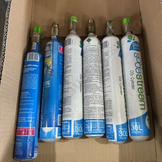 Six full soda stream CO2 cylinders.
