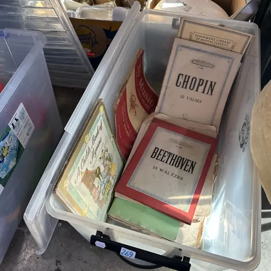 Bin with old music sheets, books etc.