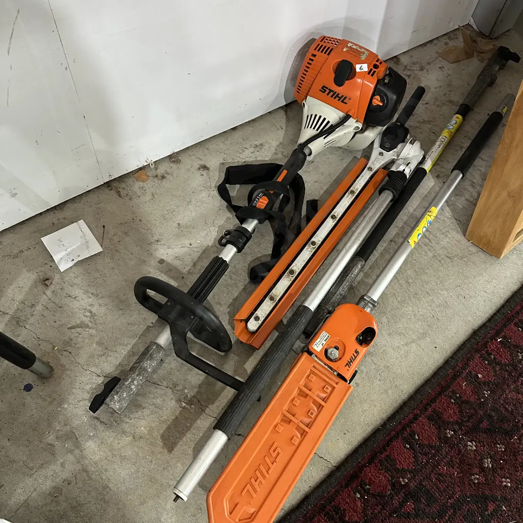 Stihl multitool head with pruner, trimmer and extention Image 1++