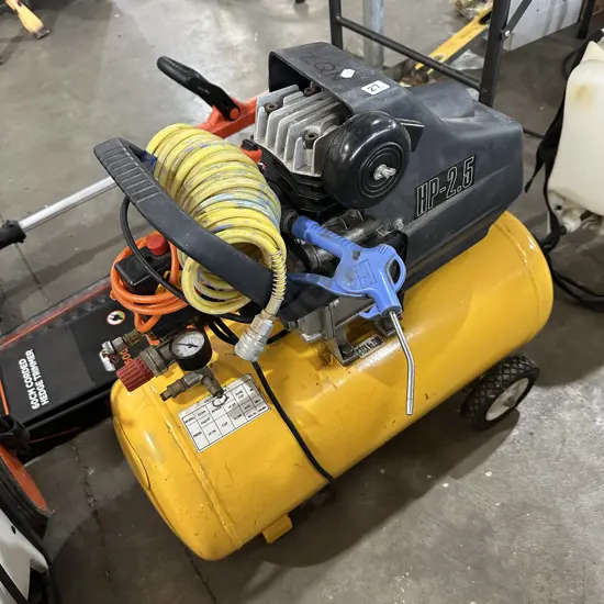 Air compressor sold as working.