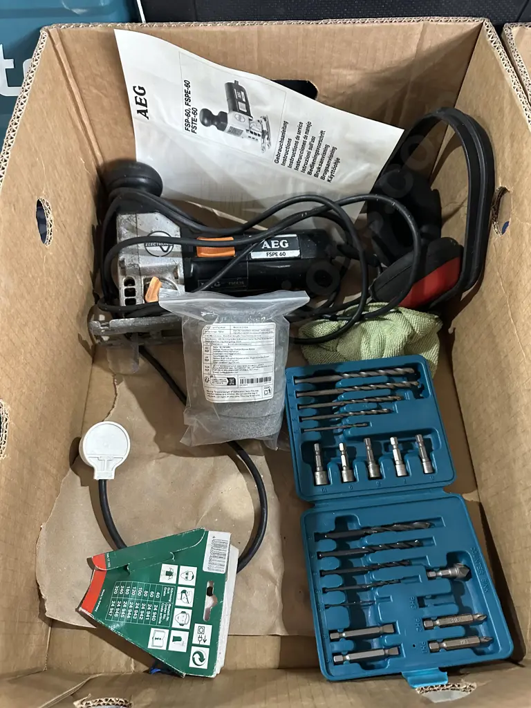 Box lot AEG PSPE 60 jig-saw, ear muffs plus Makita drill and bit set etc. Image 1++