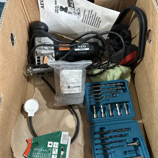 Box lot AEG PSPE 60 jig-saw, ear muffs plus Makita drill and bit set etc.