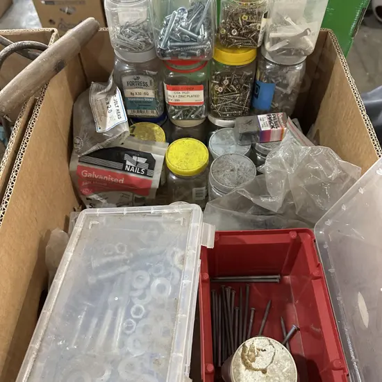 Box lot of screws, nails, washers, galvanized bolts nuts and washers, plus others.