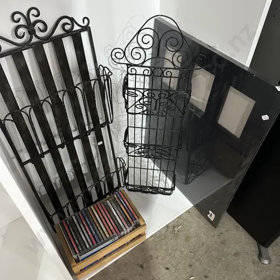 2 metal hanging wire racks, CDs and pin board