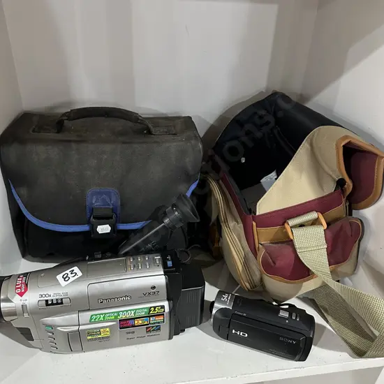 2 handy cams and cases