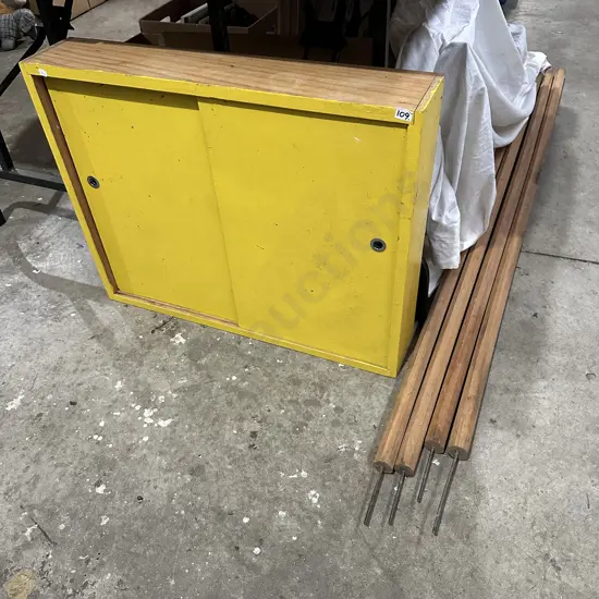 wooden poles and cabinet