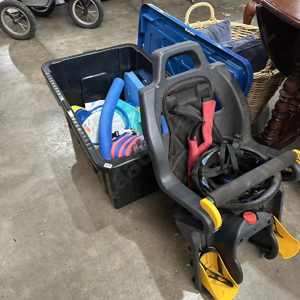 Lidded bin, contents and bike baby carrier Image 1++