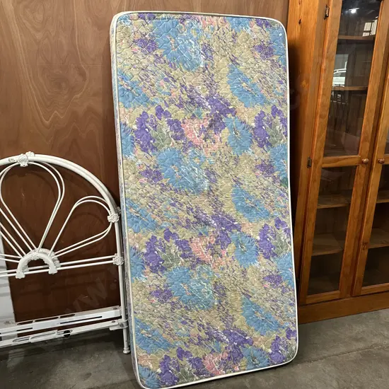 Pair of tidy single mattresses