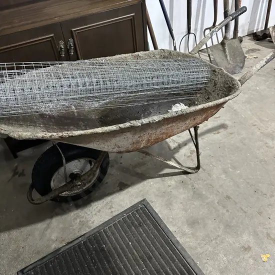 well used builders barrow and netting