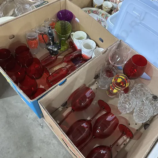 Two boxes of red glassware plus coke glasses etc.