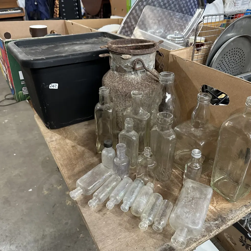 Bin of collectable bottles plus cream can. Image 1++