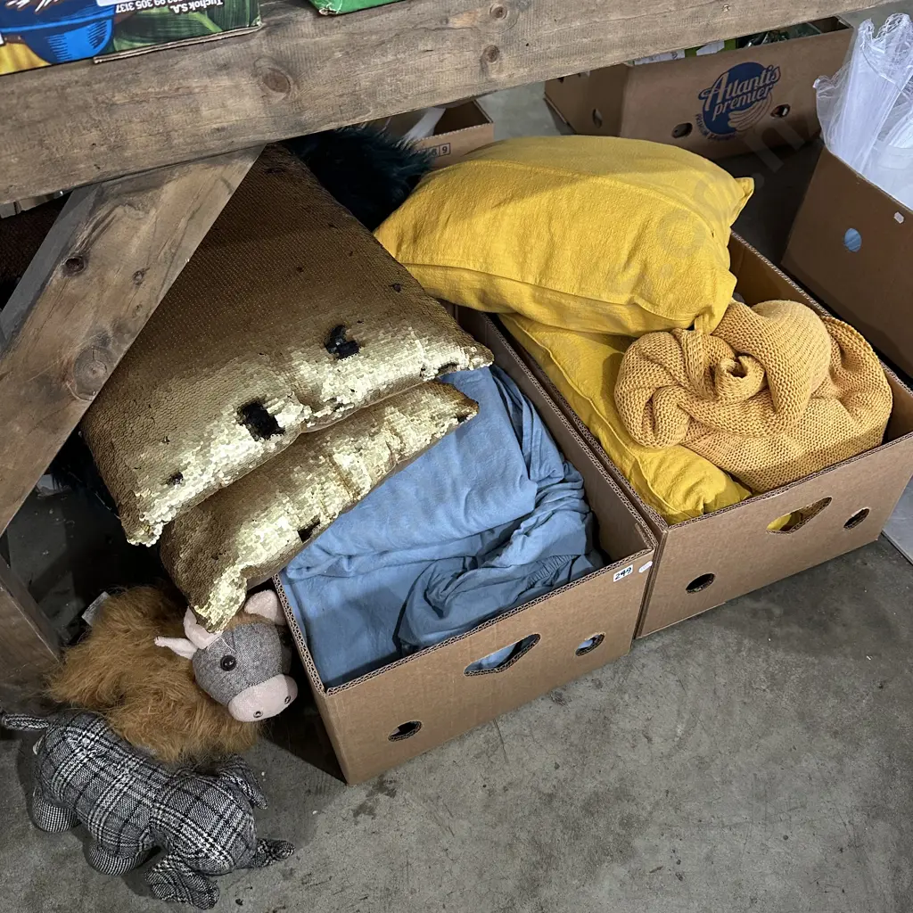 Two boxes sheets, throw, cushions, door stops. Image 1++