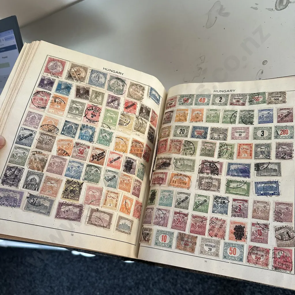 early Triumph world album incs Australian stamps Image 1++