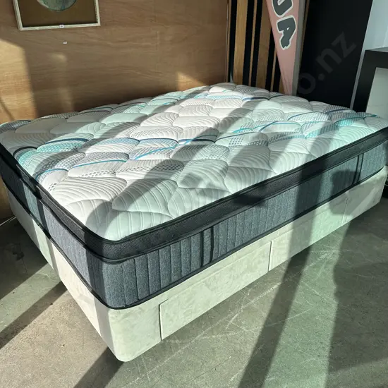 very tidy Queen mattress on double sided divan base