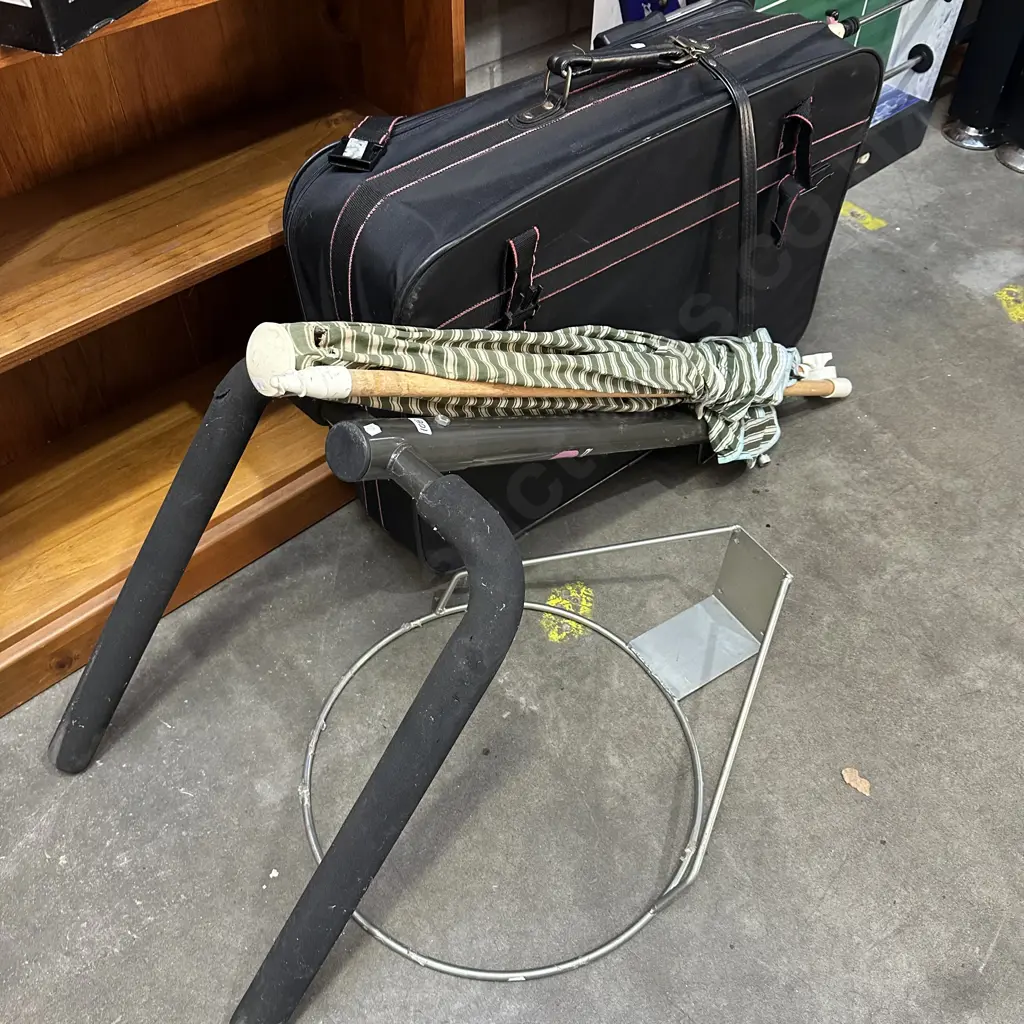 bike rack and damaged umbrella, basketball hoop and suitcase Image 1++