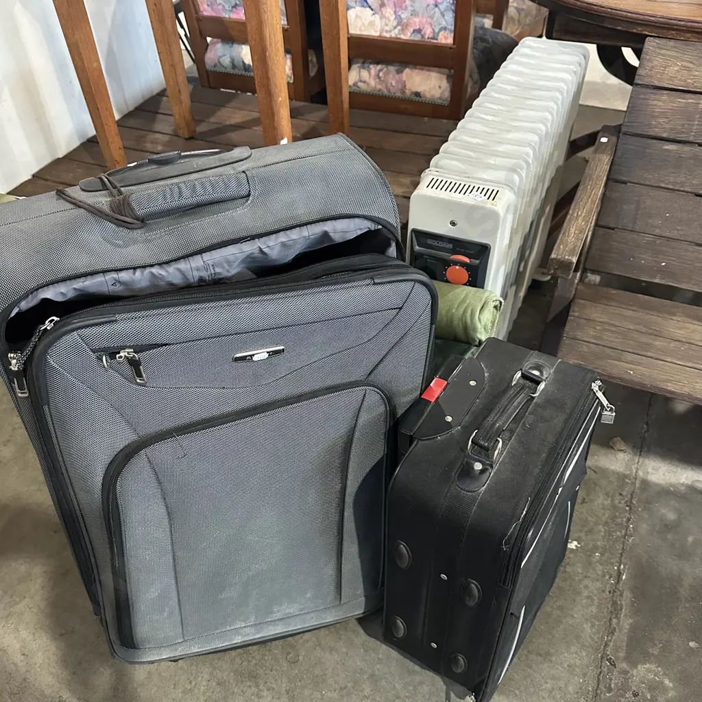 oil heater and suitcases Image 1++