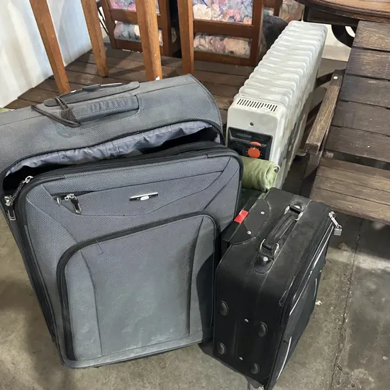 oil heater and suitcases