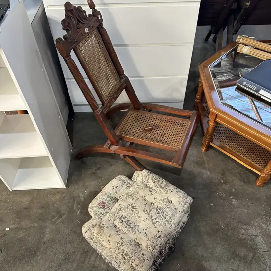 folding antique chair with cushions
