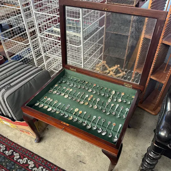 coffee table teaspoon collection plus 2 Titanic books