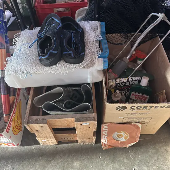 Lot of sprinkler, car care products, beer crate, gumboots and dive shoes plus net etc.