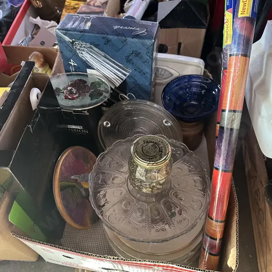 Box lot plates, boxed glasses, cake stand, picture hooks, scales, new self adhesive foil etc.
