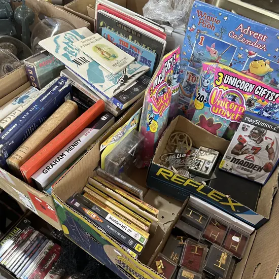 Two boxes books, badges, playstation 2 game, cufflinks etc.
